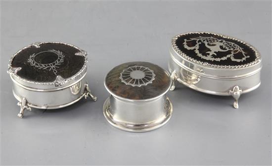 Three assorted early 20th century silver and tortoiseshell pique trinket boxes, including navette shape, largest 79mm.